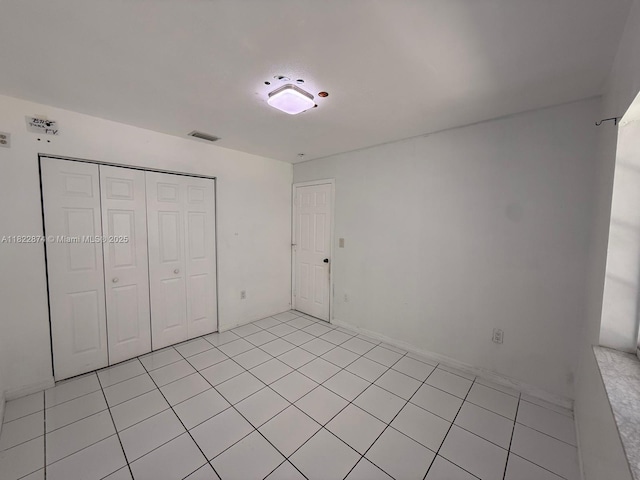 3461 SW 154th Ct, Miami, FL 33185 - unfurnished bedroom featuring a closet and light tile patterned floors