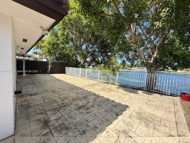3461 SW 154th Ct, Miami, FL 33185 - view of patio featuring a water view