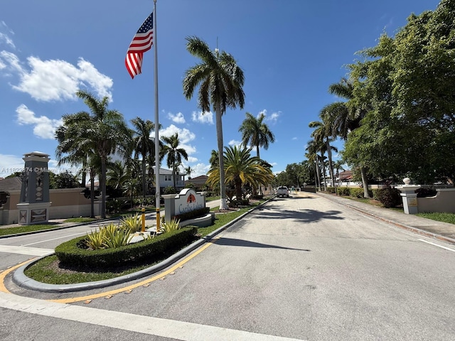 3461 SW 154th Ct, Miami, FL 33185 - view of asphalt road with curbs and sidewalks