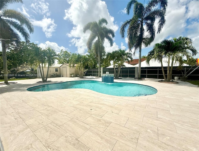 20401 SW 317th St, Homestead, FL 33030 - view of swimming pool with a patio area and a storage unit