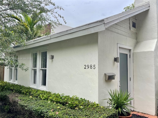 2985 Aviation Ave, Miami, FL 33133 - view of side of home with stucco siding
