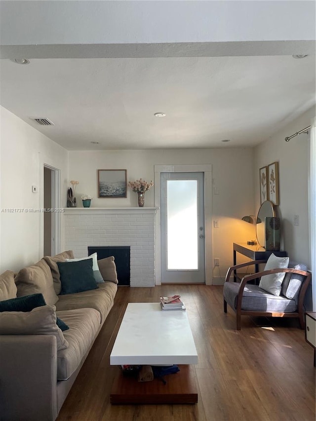 2985 Aviation Ave, Miami, FL 33133 - living area featuring wood finished floors and a brick fireplace