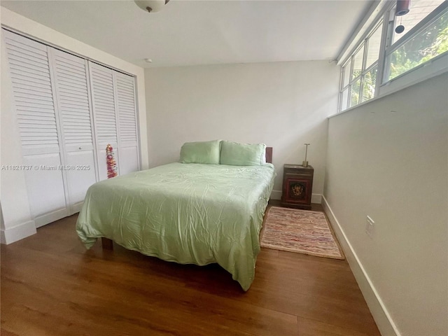 2985 Aviation Ave, Miami, FL 33133 - bedroom featuring dark wood finished floors and a closet