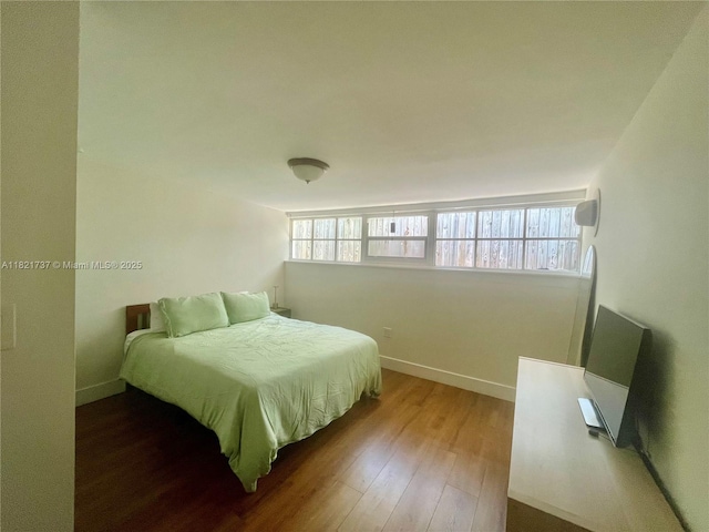 2985 Aviation Ave, Miami, FL 33133 - bedroom with wood finished floors and baseboards