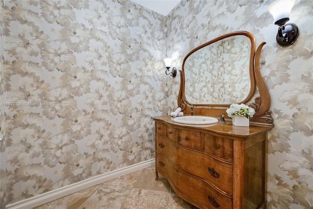 13611 Deering Bay Dr Unit 101, Coral Gables, FL 33158 - bathroom with wallpapered walls and vanity