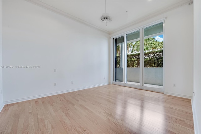 13611 Deering Bay Dr Unit 101, Coral Gables, FL 33158 - spare room with ornamental molding and light wood-style floors