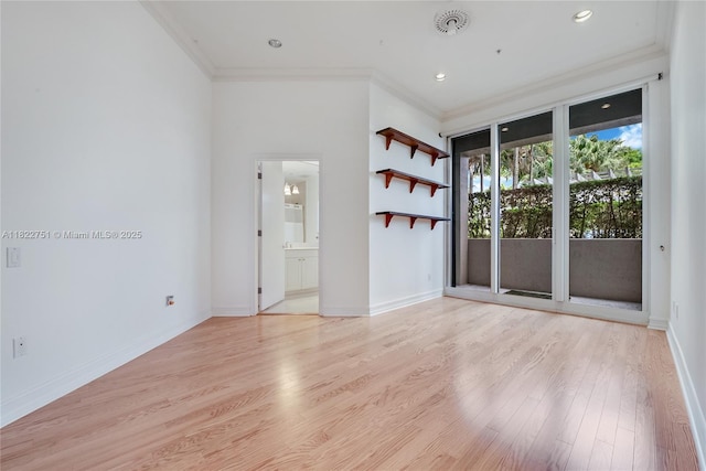 13611 Deering Bay Dr Unit 101, Coral Gables, FL 33158 - spare room with crown molding, light wood-style floors, and recessed lighting
