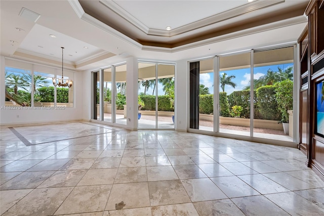 13611 Deering Bay Dr Unit 101, Coral Gables, FL 33158 - unfurnished room featuring a tray ceiling, ornamental molding, and a chandelier