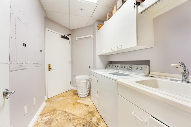 13611 Deering Bay Dr Unit 101, Coral Gables, FL 33158 - washroom featuring cabinet space, independent washer and dryer, and light stone finish flooring
