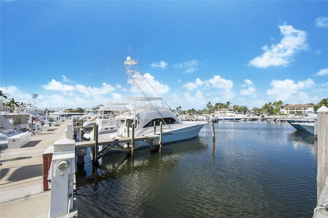 13611 Deering Bay Dr Unit 101, Coral Gables, FL 33158 - dock featuring a water view