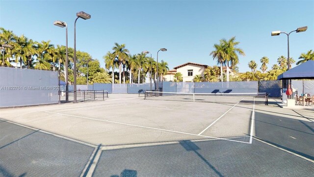 13611 Deering Bay Dr Unit 101, Coral Gables, FL 33158 - view of tennis court with community basketball court