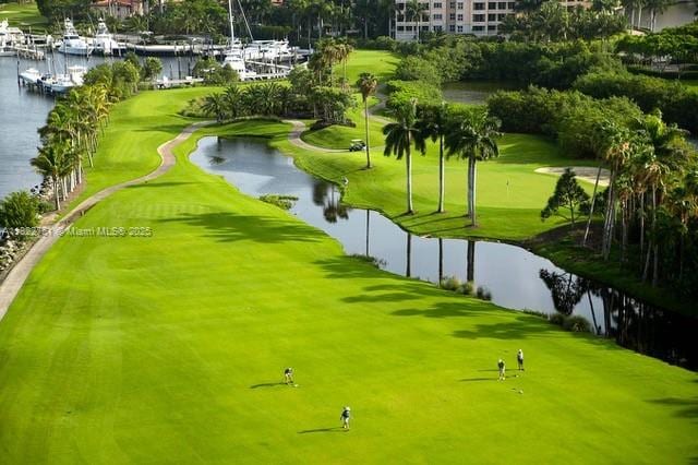 13611 Deering Bay Dr Unit 101, Coral Gables, FL 33158 - view of community featuring a water view and view of golf course