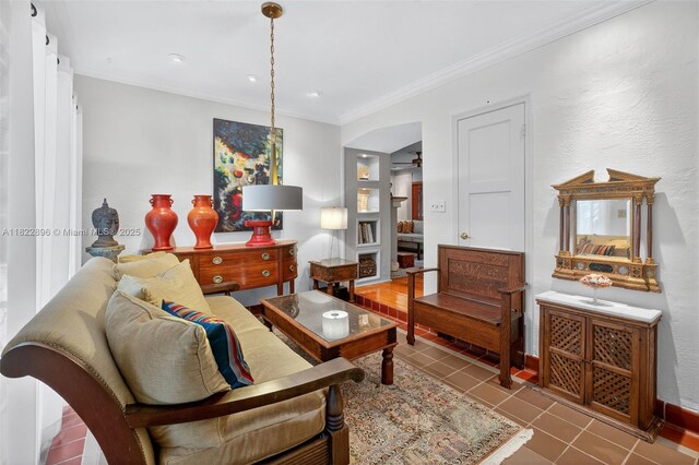 4187 S Le Jeune Rd, Miami, FL 33133 - tiled living area with crown molding and baseboards