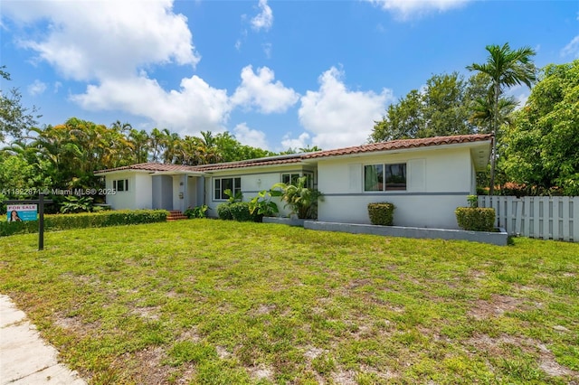 170 NW 105th St, Miami Shores, FL 33150 - view of front of home featuring stucco siding and a tiled roof