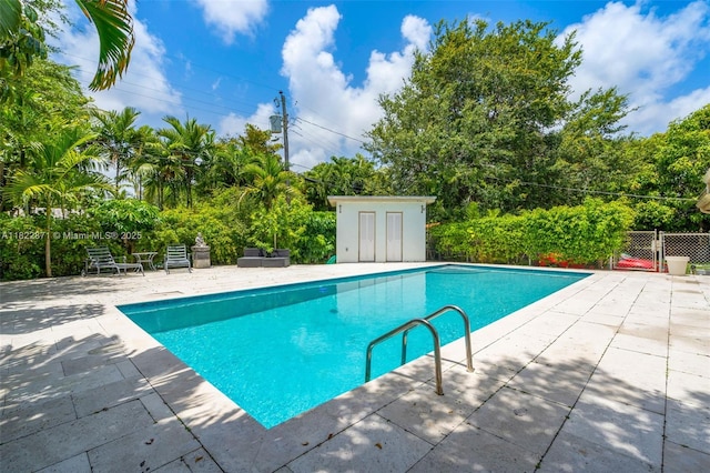 170 NW 105th St, Miami Shores, FL 33150 - view of pool featuring a patio area and view of scattered trees