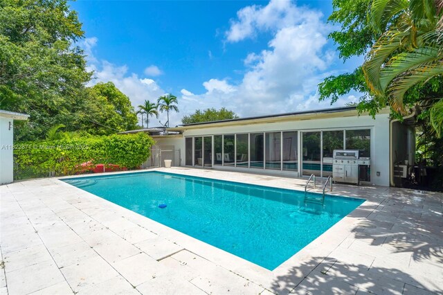 170 NW 105th St, Miami Shores, FL 33150 - view of pool featuring a patio