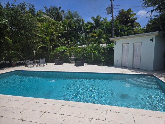 170 NW 105th St, Miami Shores, FL 33150 - outdoor pool with a patio area