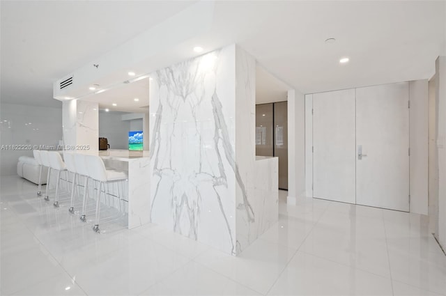 10205 Collins Ave Unit 1504, Bal Harbour, FL 33154 - corridor with light tile patterned floors