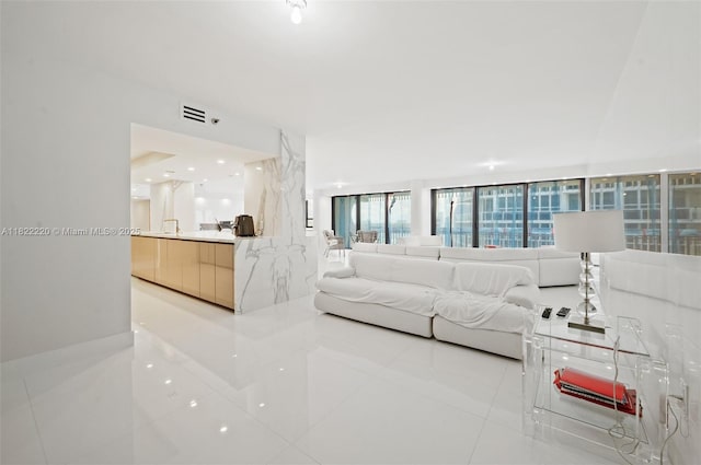 10205 Collins Ave Unit 1504, Bal Harbour, FL 33154 - living area featuring light tile patterned floors