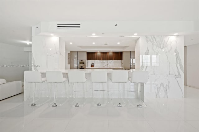 10205 Collins Ave Unit 1504, Bal Harbour, FL 33154 - living area featuring light tile patterned floors and recessed lighting