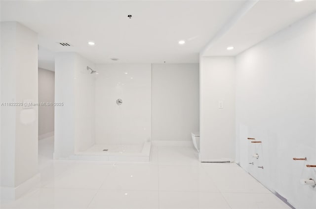10205 Collins Ave Unit 1504, Bal Harbour, FL 33154 - bathroom featuring recessed lighting, a walk in shower, and tile patterned floors