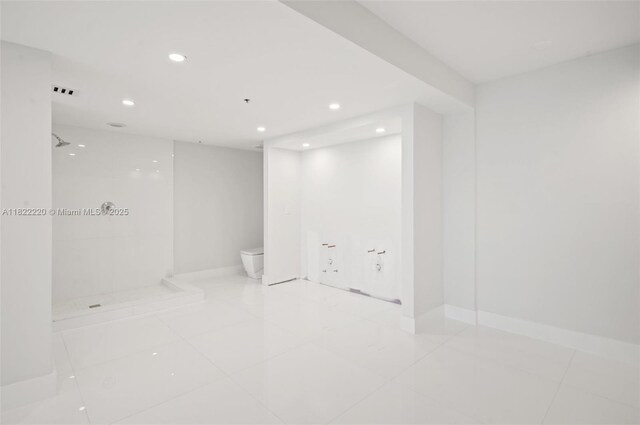 10205 Collins Ave Unit 1504, Bal Harbour, FL 33154 - tiled empty room featuring recessed lighting