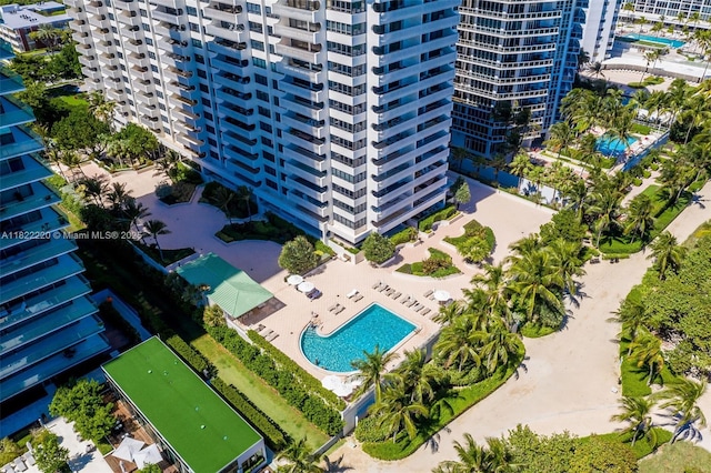 10205 Collins Ave Unit 1504, Bal Harbour, FL 33154 - drone / aerial view of a pool and apartment complex