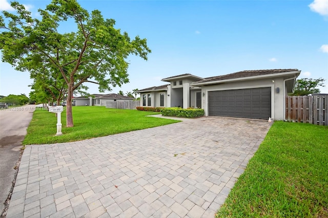 32106 SW 199th Pl, Homestead, FL 33030 - prairie-style house with decorative driveway, an attached garage, and stucco siding