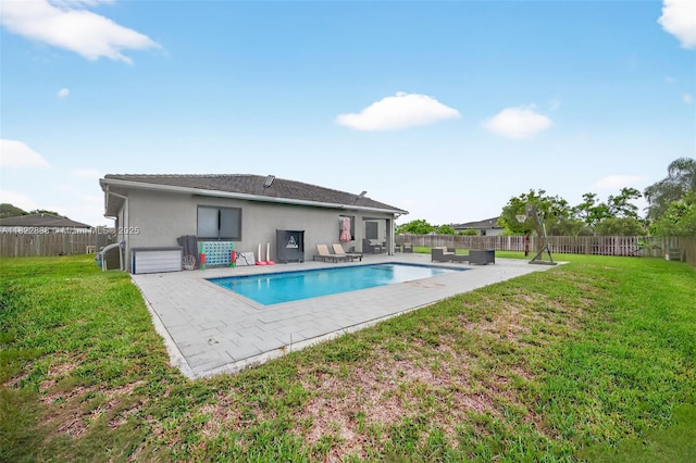 32106 SW 199th Pl, Homestead, FL 33030 - rear view of house featuring a fenced backyard, a patio area, and stucco siding