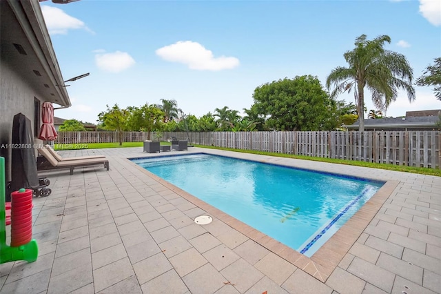 32106 SW 199th Pl, Homestead, FL 33030 - view of swimming pool with a patio area and a fenced backyard