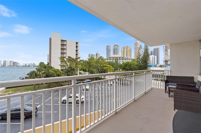 251 174th St Unit 218, Sunny Isles Beach, FL 33160 - balcony with a skyline view and a water view