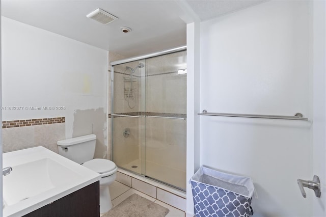 251 174th St Unit 218, Sunny Isles Beach, FL 33160 - full bathroom with a stall shower, tile walls, vanity, and tile patterned floors