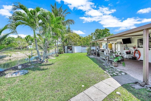 15013 SW 65th Ter, Miami, FL 33193 - fenced backyard featuring a patio area