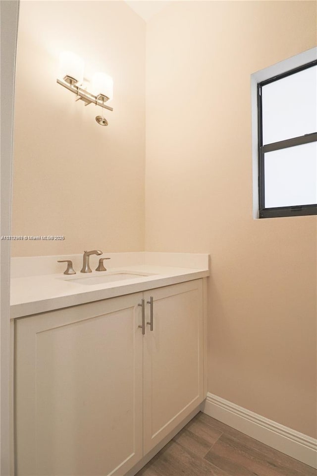 9265 NW 16th St, Pembroke Pines, FL 33024 - bathroom with wood finished floors and vanity