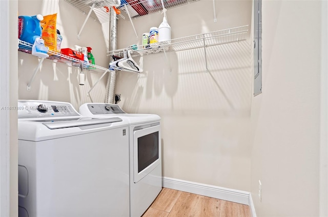 9265 NW 16th St, Pembroke Pines, FL 33024 - laundry room featuring separate washer and dryer and light wood-style flooring