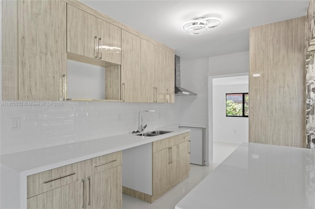 1640 NE 183rd St, North Miami Beach, FL 33179 - kitchen featuring light brown cabinetry, wall chimney range hood, and backsplash
