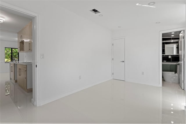 1640 NE 183rd St, North Miami Beach, FL 33179 - unfurnished bedroom featuring light tile patterned floors, recessed lighting, and connected bathroom