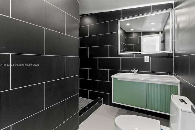 1640 NE 183rd St, North Miami Beach, FL 33179 - bathroom featuring vanity, tiled shower, and tile walls
