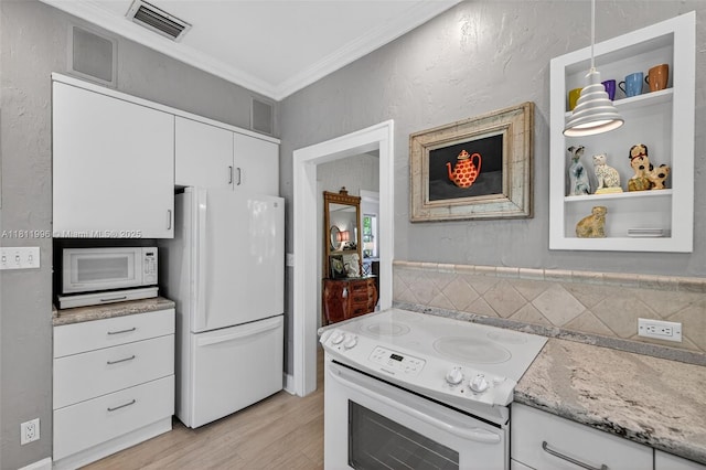 1314 SE 1st Ave, Fort Lauderdale, FL 33316 - kitchen featuring white appliances, crown molding, light wood finished floors, white cabinetry, and light stone counters
