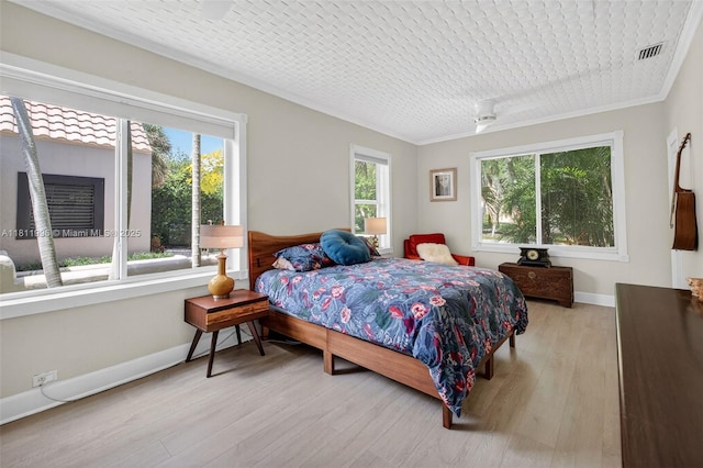 1314 SE 1st Ave, Fort Lauderdale, FL 33316 - bedroom with wood finished floors and crown molding