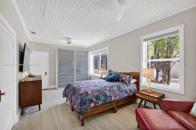 1314 SE 1st Ave, Fort Lauderdale, FL 33316 - bedroom featuring light wood-type flooring and crown molding