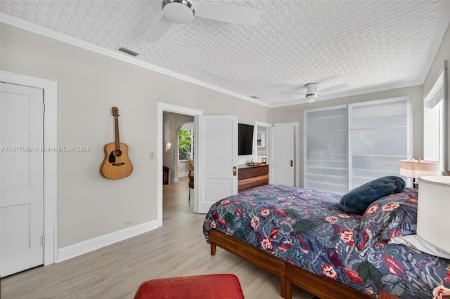1314 SE 1st Ave, Fort Lauderdale, FL 33316 - bedroom featuring light wood-style flooring, ornamental molding, and a ceiling fan
