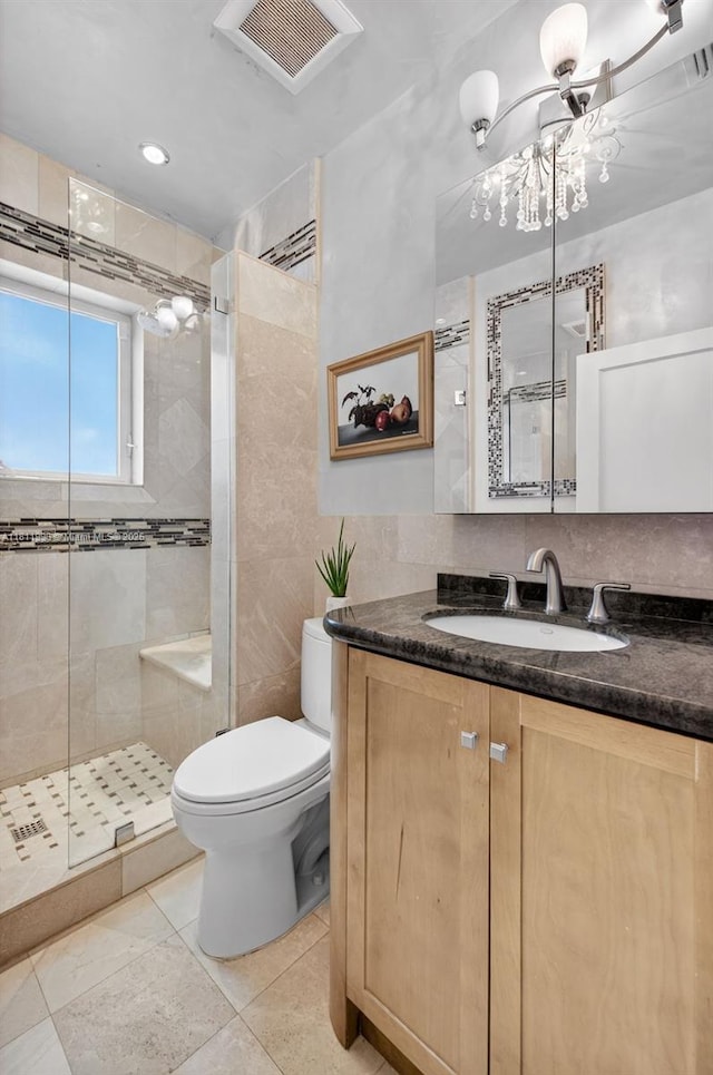 1314 SE 1st Ave, Fort Lauderdale, FL 33316 - bathroom with vanity, a stall shower, tile walls, and tile patterned floors