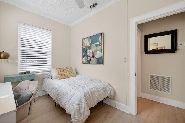 1314 SE 1st Ave, Fort Lauderdale, FL 33316 - bedroom with ornamental molding, light wood finished floors, and ceiling fan