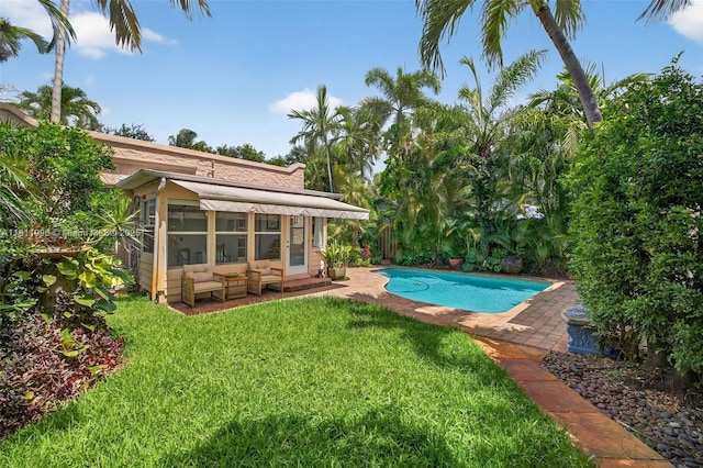 1314 SE 1st Ave, Fort Lauderdale, FL 33316 - outdoor pool with a yard, a patio, and a sunroom