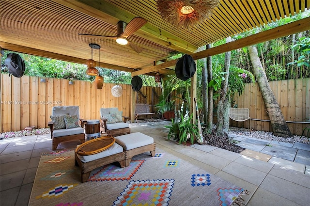 1314 SE 1st Ave, Fort Lauderdale, FL 33316 - fenced backyard with a patio area and a ceiling fan