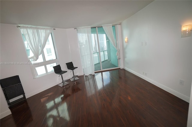 1900 N Bayshore Dr Unit 2510, Miami, FL 33132 - empty room with baseboards and wood finished floors