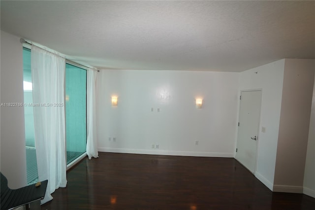 1900 N Bayshore Dr Unit 2510, Miami, FL 33132 - spare room featuring wood finished floors and a textured ceiling