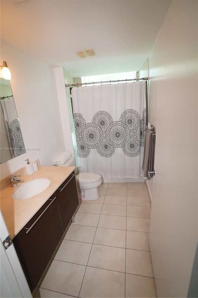 1900 N Bayshore Dr Unit 2510, Miami, FL 33132 - bathroom featuring vanity, tile patterned flooring, and a shower with curtain