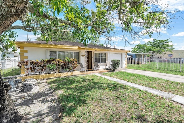 2390 Service Rd, Opa-Locka, FL 33054 - single story home with a garage, stucco siding, and driveway